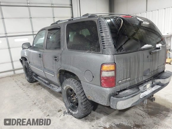 2001 Chevrolet Tahoe LS with VIN 1GNEK13T31R114154, listed as a IAAI auction lot 41387339 with 204,353 mi miles. Bid and sale history available at carsss.com. Image 3.
