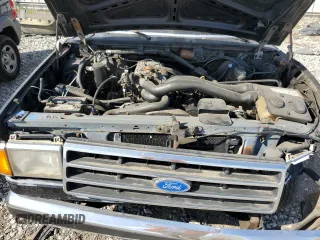 1989 Ford F-150 with VIN 1FTEX15N0KKB51052, listed as a Copart auction lot 70142074 with 74,351 mi miles and Salvage Title. Bid and sale history available at carsss.com. Image 11.