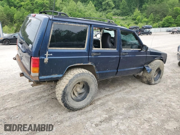 2001 Jeep Cherokee Sport with VIN 1J4FF48S21L595966, listed as a Copart auction lot 55946575 with Not provided miles and Salvage title. Bid and sale history available at DreamBid. Image 3.