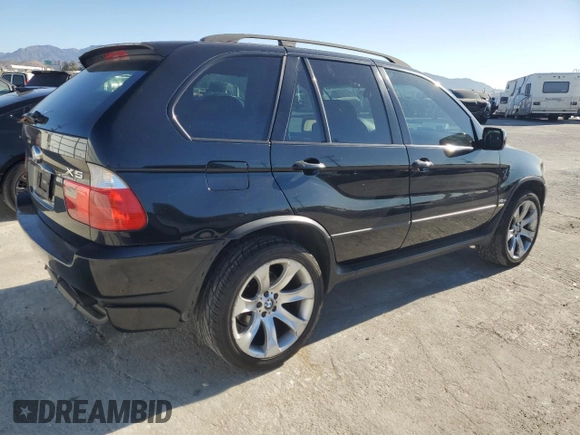 2005 BMW X5 4.8is with VIN 5UXFA93505LE83127, listed as a Copart auction lot 81653374 with 148,054 mi miles and Clean Title. Bid and sale history available at carsss.com. Image 3.