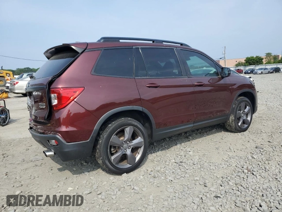 2019 Honda Passport Touring with VIN 5FNYF8H9XKB026631, listed as a Copart auction lot 61037545 with 54,041 mi miles and Salvage title. Bid and sale history available at DreamBid. Image 3.