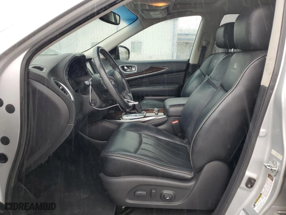 2013 Infiniti JX35 with VIN 5N1AL0MM2DC352392, listed as a Copart auction lot 69076274 with 126,629 mi miles and Salvage Title. Bid and sale history available at carsss.com. Image 7.