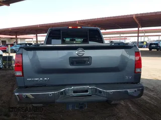 2013 Nissan Titan SL with VIN 1N6AA0ED0DN311415, listed as a IAAI auction lot 42697441 with 150,159 mi miles and . Bid and sale history available at DreamBid. Image 16.