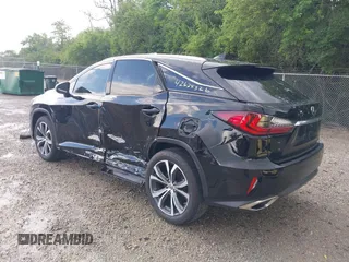 2017 Lexus RX 350 z VIN 2T2BZMCAXHC125529, wystawiony jako IAAI lot #42625326 z przebiegiem 97 503 mil mil oraz . Historia ofert i sprzedaży dostępna na DreamBid. Obrazek 3.