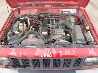 1998 Jeep Cherokee Sport with VIN 1J4FT68SXWL245626, listed as a IAAI auction lot 41630946 with 190,000 mi miles. Bid and sale history available at carsss.com. Image 10.