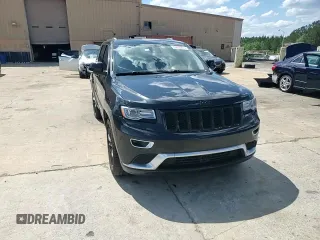 2015 Jeep Grand Cherokee Summit with VIN 1C4RJFJG6FC828922, listed as a Copart auction lot 54878415 with 125,781 mi miles and Salvage title. Bid and sale history available at DreamBid. Image 13.