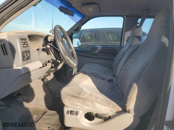 1999 Ford Super Duty F-250 XL with VIN 1FTNX21L5XEE86694, listed as a Copart auction lot 41697885 with 153,948 mi miles and Salvage Title. Bid and sale history available at carsss.com. Image 7.
