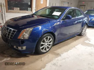2012 Cadillac CTS Luxury z VIN 1G6DG5E5XC0125819, wystawiony jako IAAI lot #42251305 z przebiegiem 233 887 mil mil oraz . Historia ofert i sprzedaży dostępna na DreamBid. Obrazek 2.