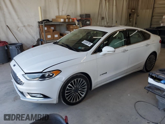 2017 Ford Fusion Hybrid Titanium z VIN 3FA6P0RU3HR400034, wystawiony jako Copart lot #62689795 z przebiegiem 109 118 mil mil oraz Szkoda całkowita • Salvage title. Historia ofert i sprzedaży dostępna na DreamBid. Obrazek 1.
