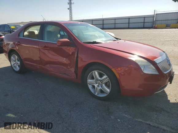 2010 Mercury Milan z VIN 3MEHM0HA3AR607241, wystawiony jako Copart lot #61225435 z przebiegiem 111 038 mil mil oraz Szkoda całkowita • Salvage title. Historia ofert i sprzedaży dostępna na DreamBid. Obrazek 4.