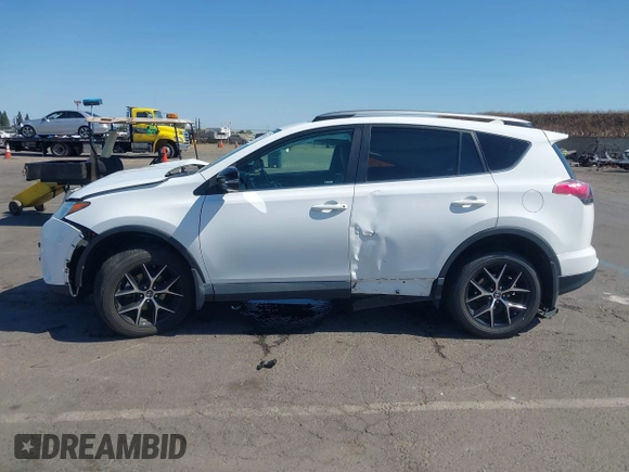 2017 Toyota RAV4 SE with VIN 2T3JFREV0HW609611, listed as a IAAI auction lot 42618053 with 85,915 mi miles and . Bid and sale history available at DreamBid. Image 14.