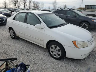 2006 Kia Spectra EX with VIN KNAFE121265208526, listed as a Copart auction lot 80300604 with 101,780 mi miles and Salvage Title. Bid and sale history available at carsss.com. Image 4.
