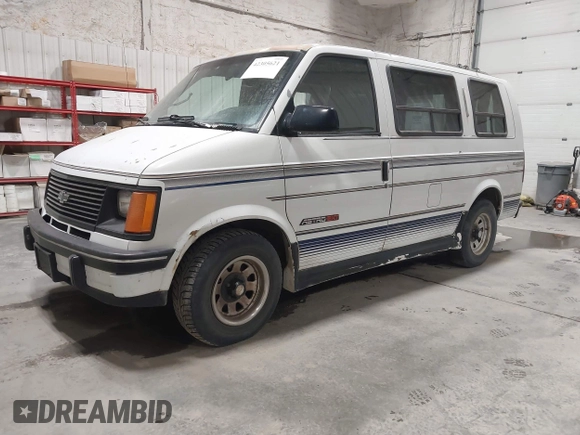 1994 Chevrolet Astro Cargo z VIN 1GBDM19Z0RB167297, wystawiony jako IAAI lot #42305621 z przebiegiem 154 683 mil mil oraz . Historia ofert i sprzedaży dostępna na DreamBid. Obrazek 2.