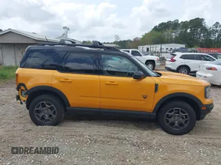 2022 Ford Bronco Sport Badlands z VIN 3FMCR9D97NRD33203, wystawiony jako IAAI lot #41951768 z przebiegiem 44 216 mil mil oraz . Historia ofert i sprzedaży dostępna na DreamBid. Obrazek 13.