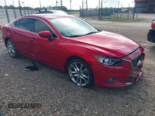 2014 Mazda 6 i Grand Touring with VIN JM1GJ1W57E1104457, listed as a IAAI auction lot 41947505 with 185,621 mi miles. Bid and sale history available at carsss.com. Image 1.
