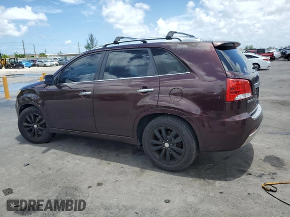 2012 Kia Sorento SX with VIN 5XYKW4A29CG308152, listed as a Copart auction lot 64895355 with 126,816 mi miles and Salvage title. Bid and sale history available at DreamBid. Image 2.