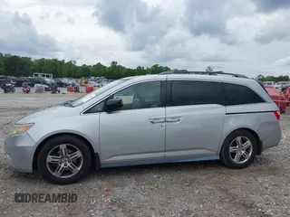 2012 Honda Odyssey Touring с VIN 5FNRL5H90CB083157, выставлен на аукционе IAAI как лот 42176609 с пробегом 250 000 миль миль и . История ставок и продаж доступна на DreamBid. Изображение 14.