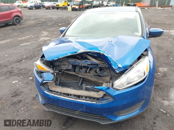 2018 Ford Focus SE z VIN 1FADP3F23JL200674, wystawiony jako IAAI lot #42009238 z przebiegiem 78 007 mil mil oraz . Historia ofert i sprzedaży dostępna na DreamBid. Obrazek 6.