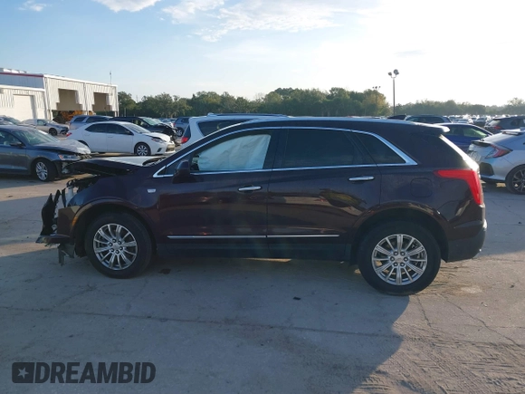 2018 Cadillac XT5 FWD with VIN 1GYKNARS6JZ179706, listed as a IAAI auction lot 41195570 with 80,676 mi miles. Bid and sale history available at carsss.com. Image 15.