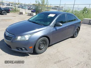 2014 Chevrolet Cruze LS with VIN 1G1PA5SH1E7344701, listed as a IAAI auction lot 42267012 with 200,909 mi miles and . Bid and sale history available at DreamBid. Image 2.