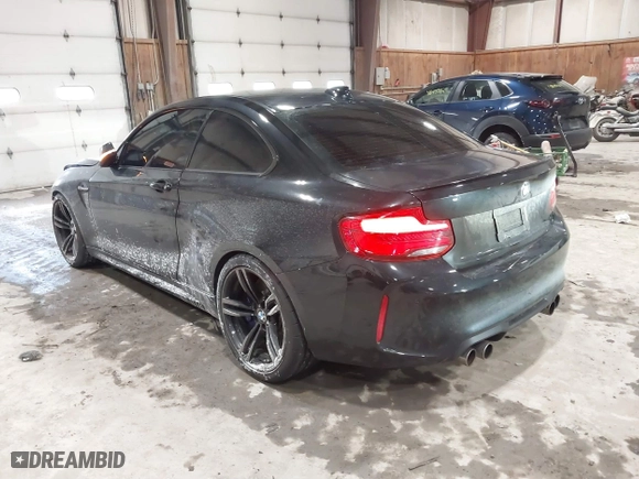 2018 BMW M2 with VIN WBS1J5C56JVD36919, listed as a IAAI auction lot 41587121 with 46,356 mi miles. Bid and sale history available at carsss.com. Image 3.