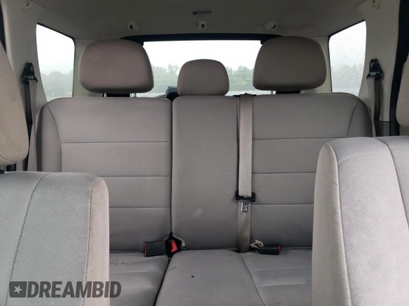 2012 Ford Escape XLT z VIN 1FMCU9DG4CKA23816, wystawiony jako Copart lot #61084425 z przebiegiem Nie podano mil oraz Szkoda całkowita • Salvage title. Historia ofert i sprzedaży dostępna na DreamBid. Obrazek 10.