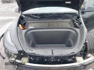 2022 Tesla Model Y Performance z VIN 7SAYGDEF7NF457757, wystawiony jako IAAI lot #42263449 z przebiegiem 65 747 mil mil oraz . Historia ofert i sprzedaży dostępna na DreamBid. Obrazek 10.
