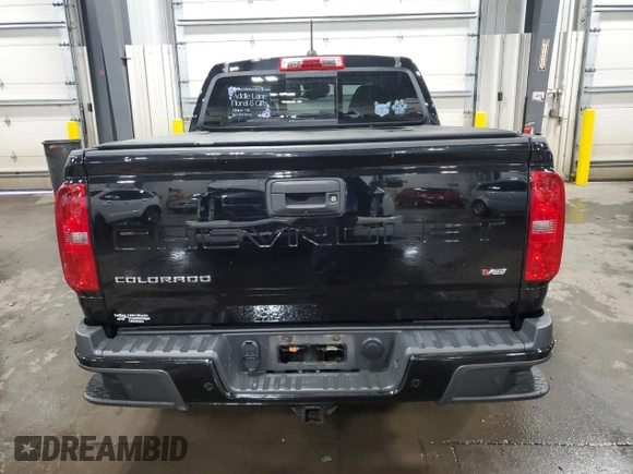 2021 Chevrolet Colorado 4WD Z71 with VIN 1GCGTDEN8M1171810, listed as a Copart auction lot 57409115 with 100,579 mi miles and Salvage title. Bid and sale history available at DreamBid. Image 6.