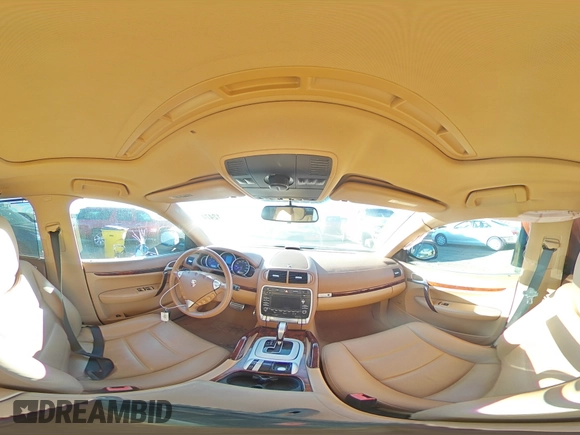 2009 Porsche Cayenne S with VIN WP1AB29P79LA43660, listed as a Copart auction lot 76612474 with 89,314 mi miles and Salvage title. Bid and sale history available at DreamBid. Image 14.