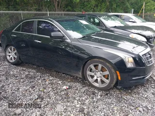 2015 Cadillac ATS Standard RWD z VIN 1G6AA5RA9F0103505, wystawiony jako IAAI lot #42434416 z przebiegiem 100 915 mil mil oraz . Historia ofert i sprzedaży dostępna na DreamBid. Obrazek 1.