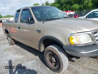 1999 Ford F-150 with VIN 1FTRX18W9XNB33354, listed as a IAAI auction lot 42380827 with Not provided miles and . Bid and sale history available at DreamBid. Image 1.