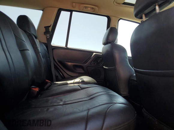 2004 Jeep Grand Cherokee Laredo with VIN 1J4GW48S84C182135, listed as a Copart auction lot 62224975 with 187,938 mi miles and Clean title. Bid and sale history available at DreamBid. Image 11.