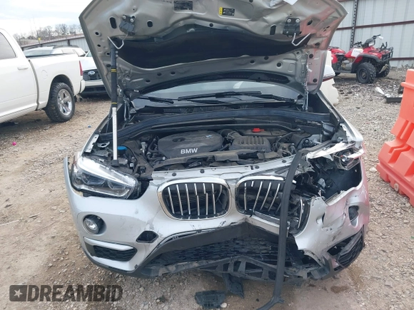 2019 BMW X1 sDrive28i z VIN WBXHU7C52K3H44360, wystawiony jako IAAI lot #41709431 z przebiegiem 56 432 mil mil oraz . Historia ofert i sprzedaży dostępna na DreamBid. Obrazek 10.