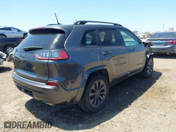 2019 Jeep Cherokee Limited with VIN 1C4PJMDX7KD460830, listed as a IAAI auction lot 41987186 with 118,202 mi miles and . Bid and sale history available at DreamBid. Image 4.