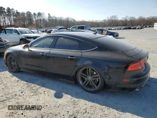 2014 Audi S7 Prestige with VIN WAUW2AFC1EN063045, listed as a Copart auction lot 43570525 with 158,875 mi miles and Salvage Title. Bid and sale history available at carsss.com. Image 2.