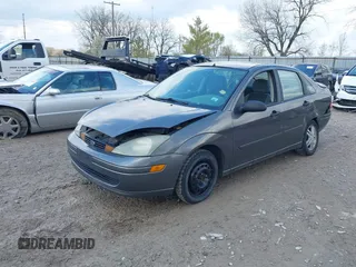 2004 Ford Focus SE with VIN 1FAFP34334W177338, listed as a IAAI auction lot 42003202 with 190,581 mi miles and . Bid and sale history available at DreamBid. Image 2.