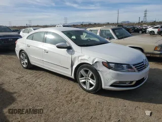 2014 Volkswagen CC R-Line with VIN WVWBP7AN0EE509782, listed as a Copart auction lot 87114074 with 66,204 mi miles and Salvage Title. Bid and sale history available at carsss.com. Image 4.