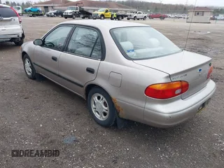 1999 Chevrolet Prizm z VIN 1Y1SK5488XZ446933, wystawiony jako IAAI lot #42167872 z przebiegiem 218 987 mil mil oraz . Historia ofert i sprzedaży dostępna na DreamBid. Obrazek 3.