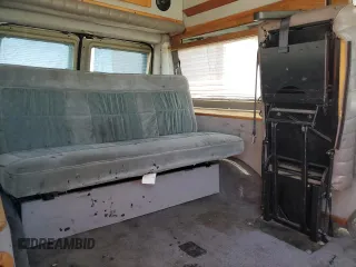 2003 Ford Econoline Cargo Recreational with VIN 1FDPE24L83HA48184, listed as a Copart auction lot 68382614 with 235,732 mi miles and Salvage Title. Bid and sale history available at DreamBid. Image 11.