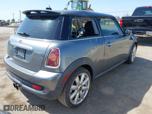 2007 MINI Hardtop S with VIN WMWMF73597TL86892, listed as a IAAI auction lot 42157544 with 93,097 mi miles and . Bid and sale history available at DreamBid. Image 4.