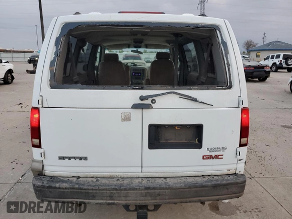 2003 GMC Safari z VIN 1GKDM19XX3B513779, wystawiony jako Copart lot #80021574 z przebiegiem 188 737 mil mil oraz Szkoda całkowita • Salvage title. Historia ofert i sprzedaży dostępna na DreamBid. Obrazek 6.