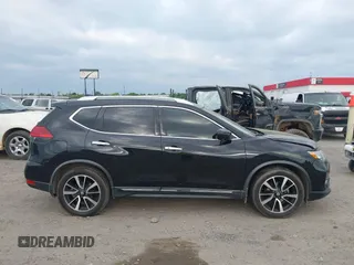 2017 Nissan Rogue SL with VIN JN8AT2MT2HW147638, listed as a IAAI auction lot 42062098 with 198,747 mi miles and . Bid and sale history available at DreamBid. Image 13.