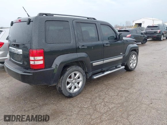 2012 Jeep Liberty Sport with VIN 1C4PJMAKXCW192564, listed as a IAAI auction lot 41948090 with 156,027 mi miles. Bid and sale history available at carsss.com. Image 4.