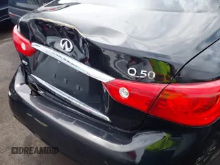 2015 Infiniti Q50 z VIN JN1BV7AR6FM412573, wystawiony jako IAAI lot #41796802 z przebiegiem 136 410 mil mil oraz . Historia ofert i sprzedaży dostępna na DreamBid. Obrazek 20.