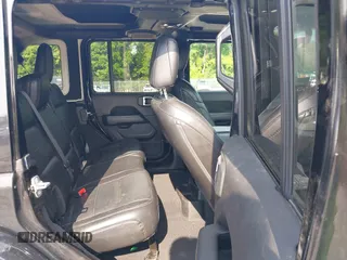 2020 Jeep Wrangler Unlimited Sahara High Altitude with VIN 1C4HJXEGXLW182581, listed as a IAAI auction lot 42612084 with 52,656 mi miles and . Bid and sale history available at DreamBid. Image 8.