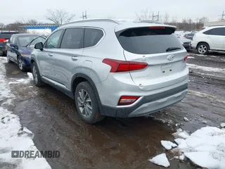 2019 Hyundai Santa Fe Ultimate with VIN 5NMS5CAD1KH000394, listed as a IAAI auction lot 41455421 with 42,886 mi miles and . Bid and sale history available at DreamBid. Image 3.