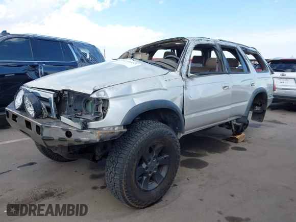 1998 Toyota 4Runner SR5 z VIN JT3HN86R2W0172312, wystawiony jako IAAI lot #42214433 z przebiegiem 259 170 mil mil oraz . Historia ofert i sprzedaży dostępna na DreamBid. Obrazek 6.