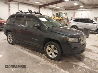 2016 Jeep Compass Sport with VIN 1C4NJCBA1GD559571, listed as a IAAI auction lot 41913639 with 175,038 mi miles. Bid and sale history available at carsss.com. Image 1.