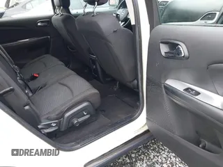 2015 Dodge Journey SE z VIN 3C4PDCAB6FT736330, wystawiony jako IAAI lot #41837047 z przebiegiem 123 567 mil mil oraz . Historia ofert i sprzedaży dostępna na DreamBid. Obrazek 8.