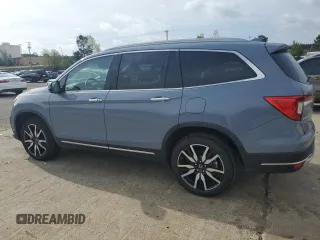 2022 Honda Pilot Touring 7-Passenger z VIN 5FNYF5H69NB031540, wystawiony jako Copart lot #51661185 z przebiegiem 58 316 mil mil oraz Szkoda całkowita • Salvage title. Historia ofert i sprzedaży dostępna na DreamBid. Obrazek 2.